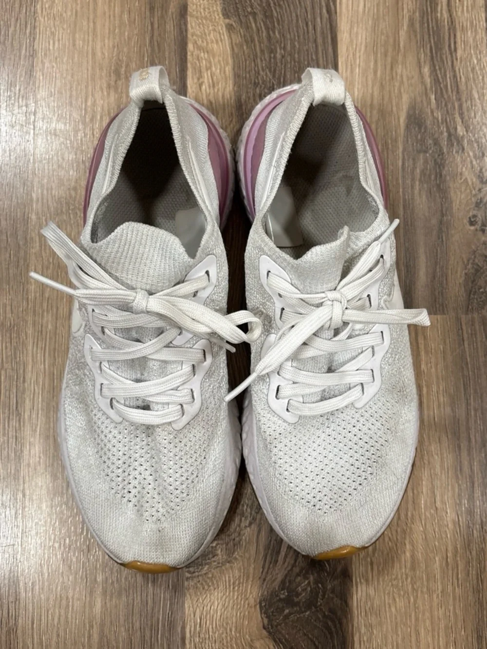 Nike Women's White Knit Sneakers with Pink Heel Accent